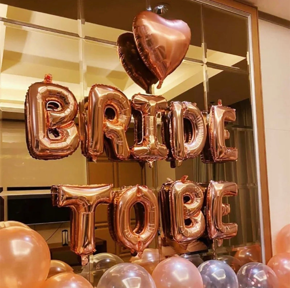 Rose gold bride to be balloons